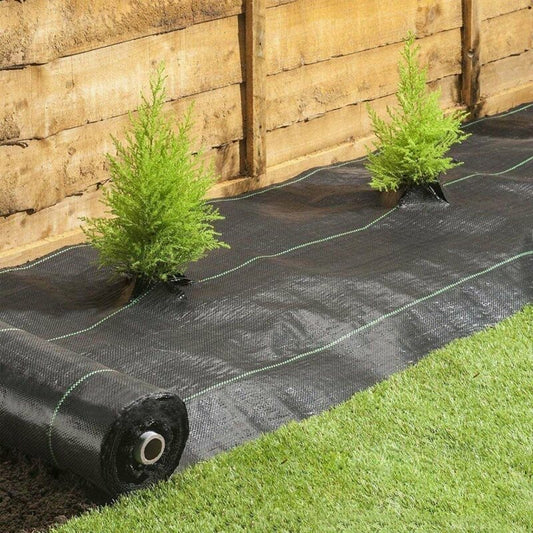 Image of Layfair Membrane installed in a garden setting, surrounded by lush plants and grass